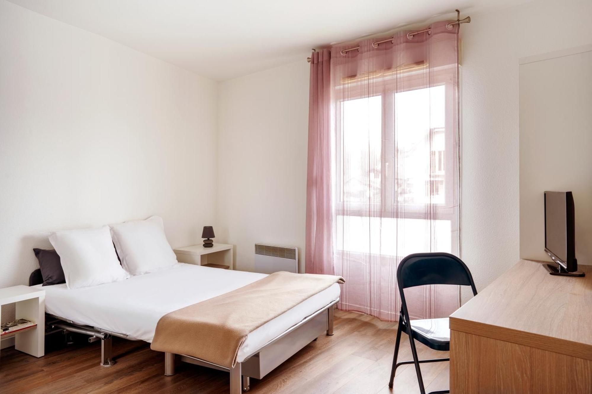 Sejours & Affaires Annecy Le Pont Neuf Aparthotel Cran-Gévrier Exterior foto