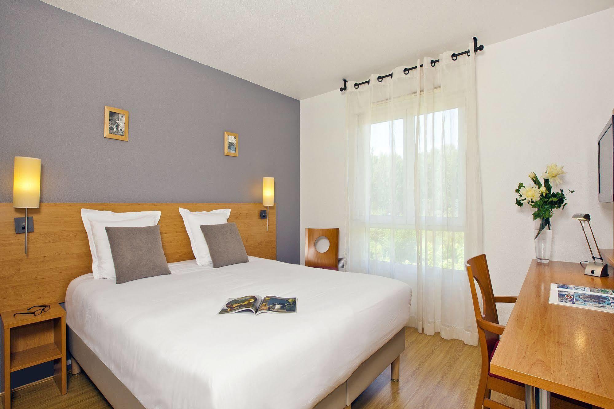 Sejours & Affaires Annecy Le Pont Neuf Aparthotel Cran-Gévrier Exterior foto